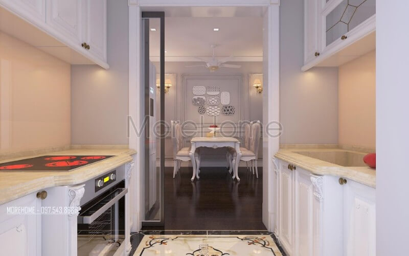 Mẫu tủ bếp tân cổ điển được phân chia hệ tủ một cách hợp lí, vừa dễ dàng nấu nướng, vừa lưu trữ vật dụng nấu nướng, gia vị... một cách phù hợp. Mẫu nội thất chung cư đẹp