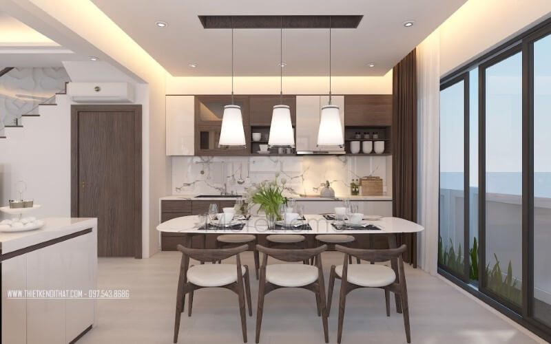 Bộ bàn ghế ghế gỗ óc chó tự nhiên kết hợp tủ bếp hiện đại vân gỗ óc chó tạo nên vẻ đẹp đồng nhất nhưng không kém phần độc đáo trong gian bếp hiện đại.