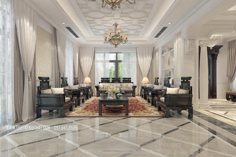 Lựa chọn 2 tone màu chủ đạo là trắng và đen, cùng với sự sắp xếp đồ gỗ nội thất hợp lí, không gian phòng khách trở nên sang chảnh, đẳng cấp mà không mất đi vẻ đẹp truyền thống người Việt